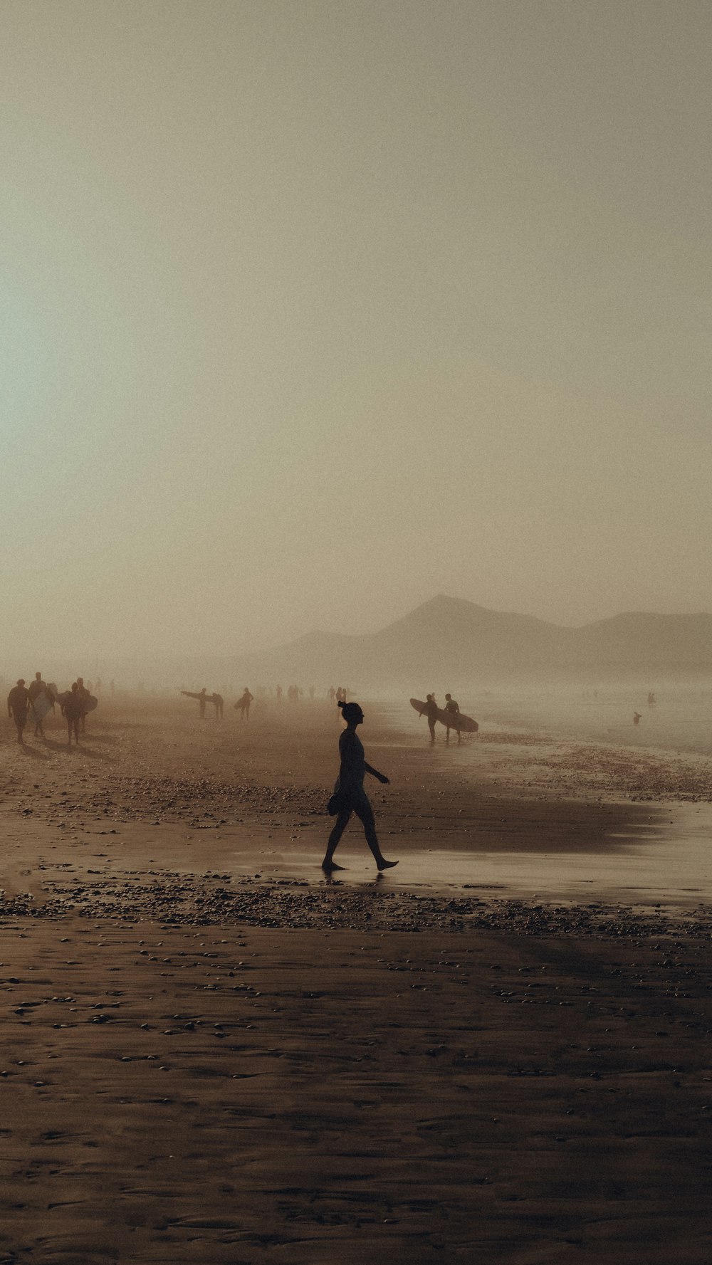 a person walking on a beach