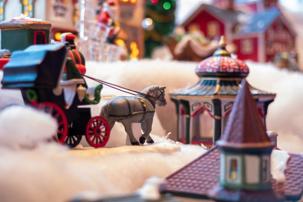 a toy horse and carriage