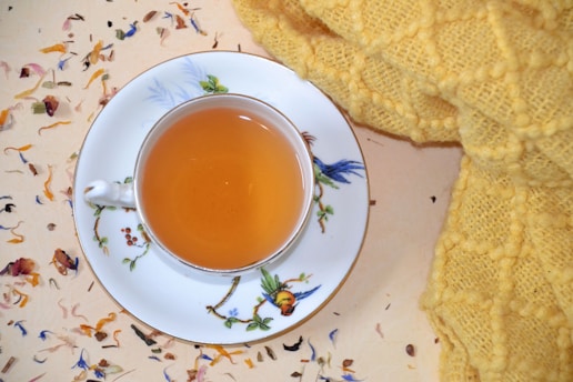 a cup of Chamomile Tea on a plate