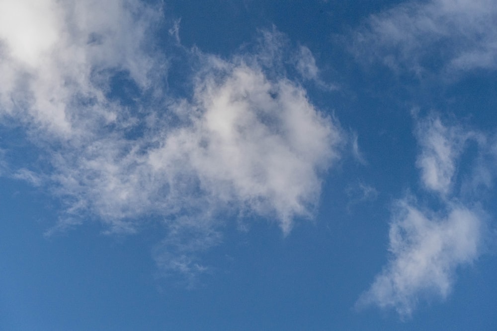 a blue sky with white clouds