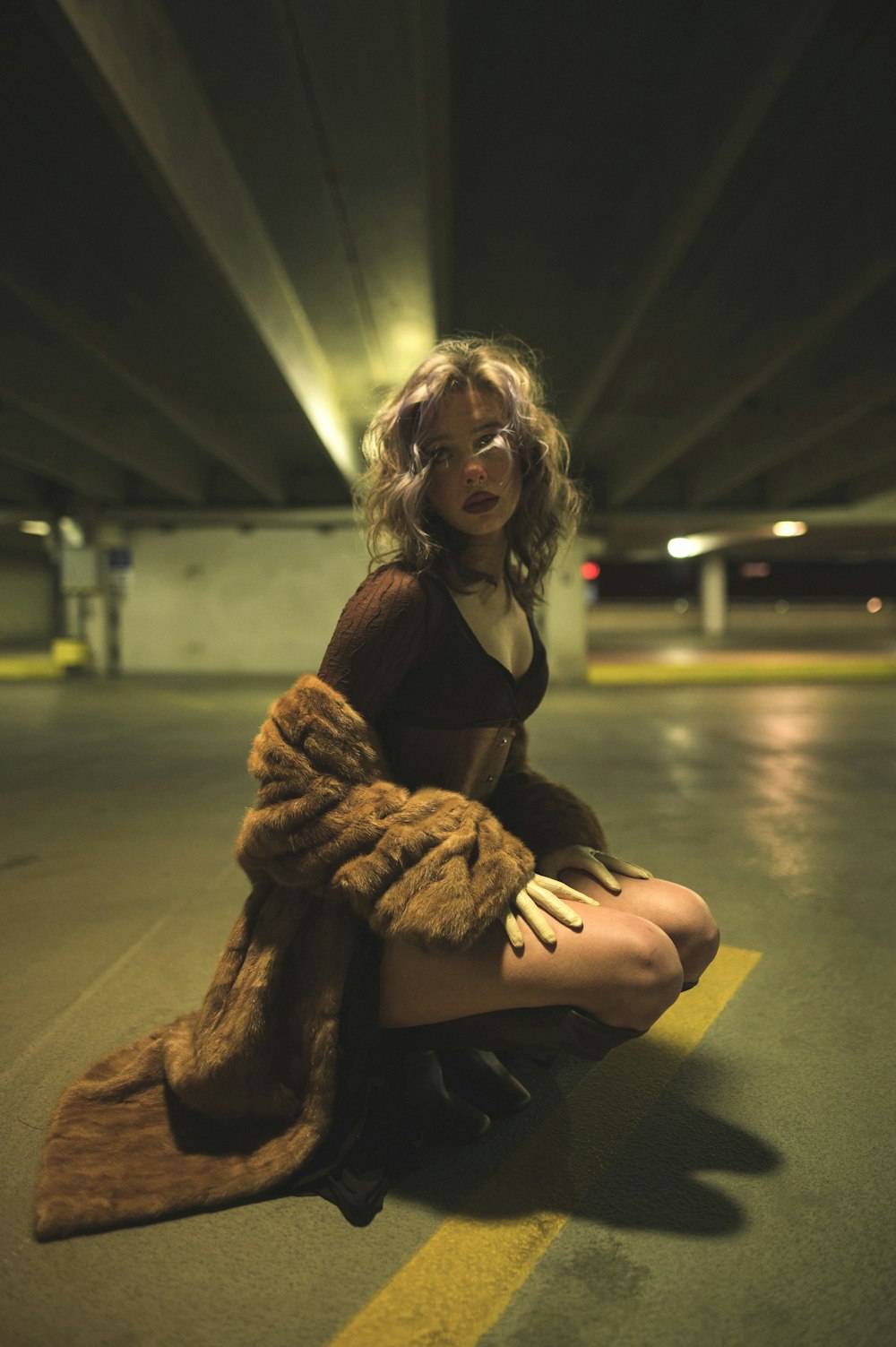 a woman sitting on the ground