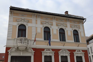a building with a flag on the roof
