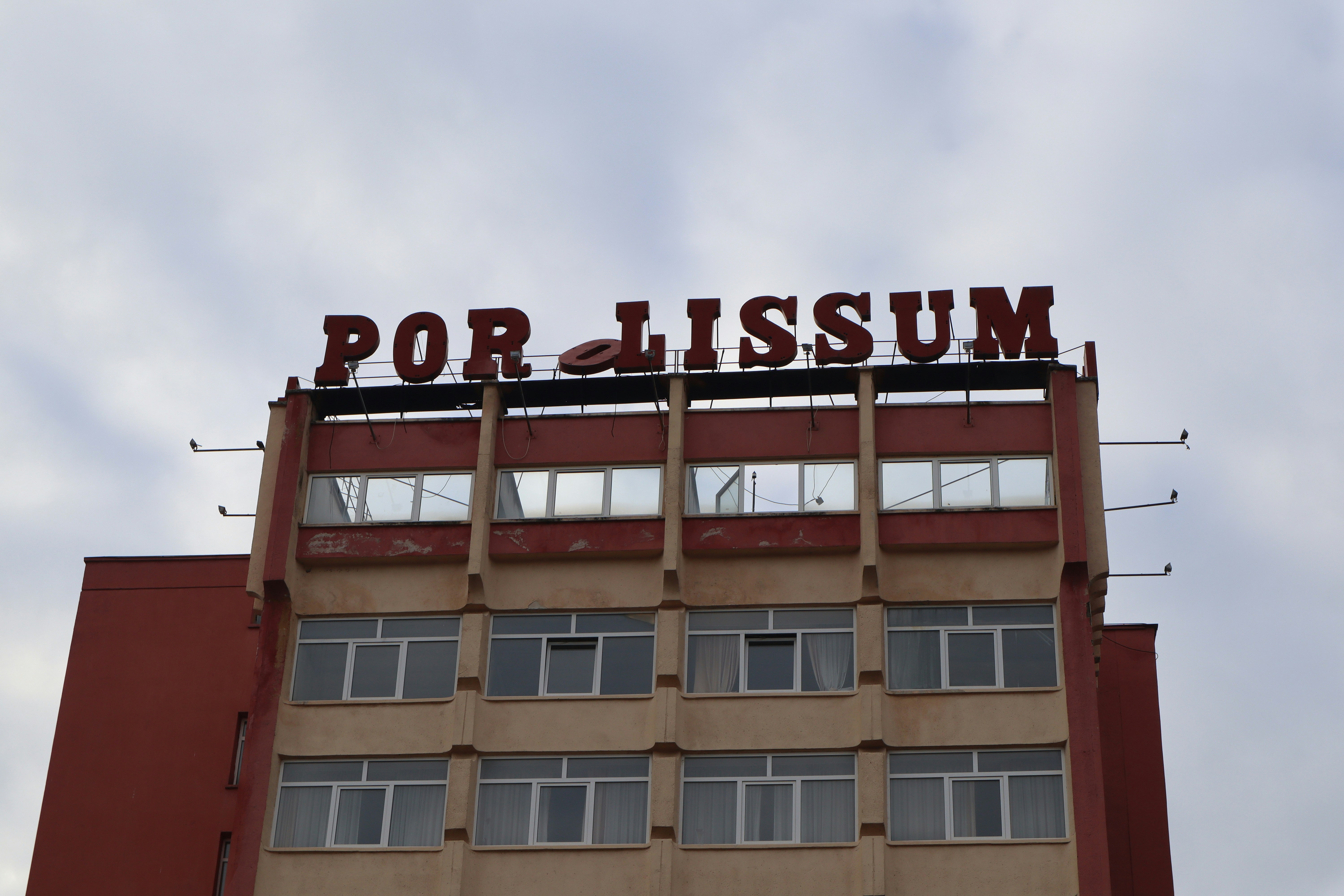 a large building with a sign on it