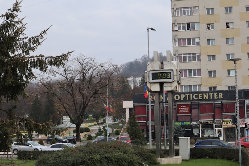 a street with cars and buildings