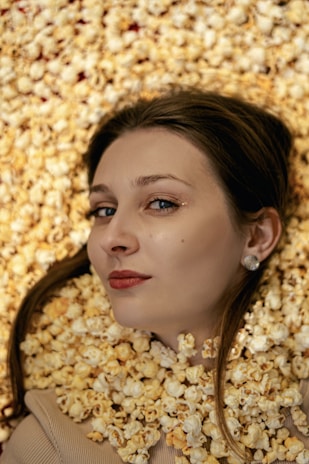 a woman with a large head of gold jewelry