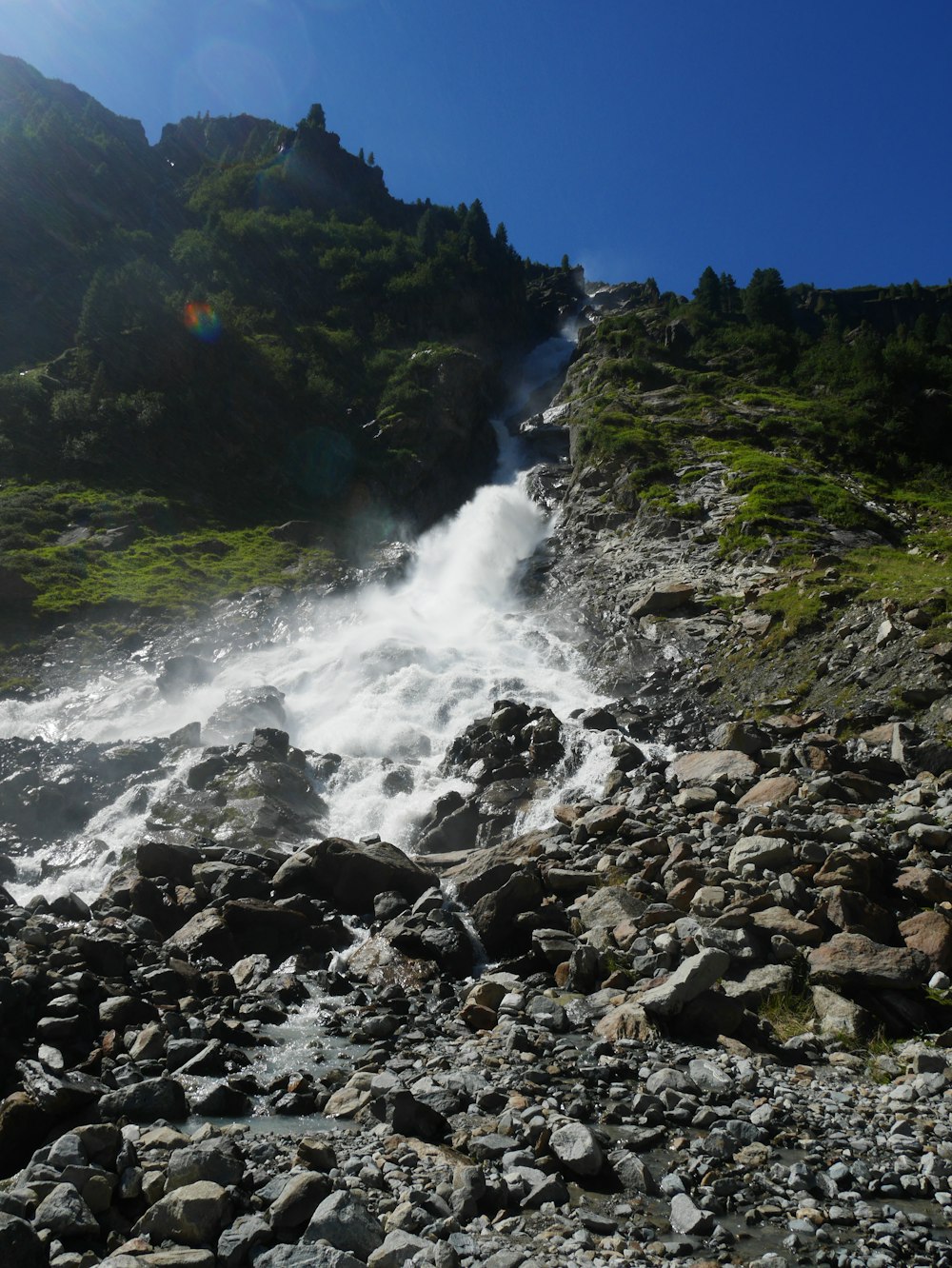 a river flowing through a rocky area