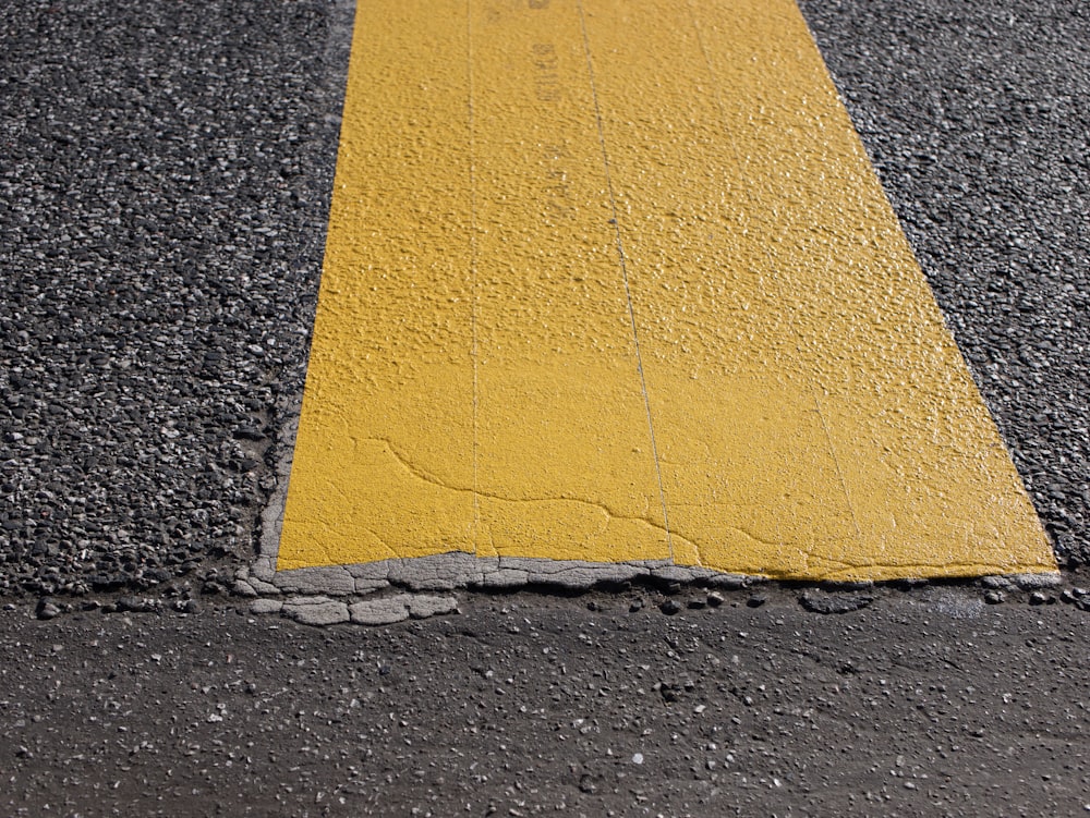 a yellow painted road