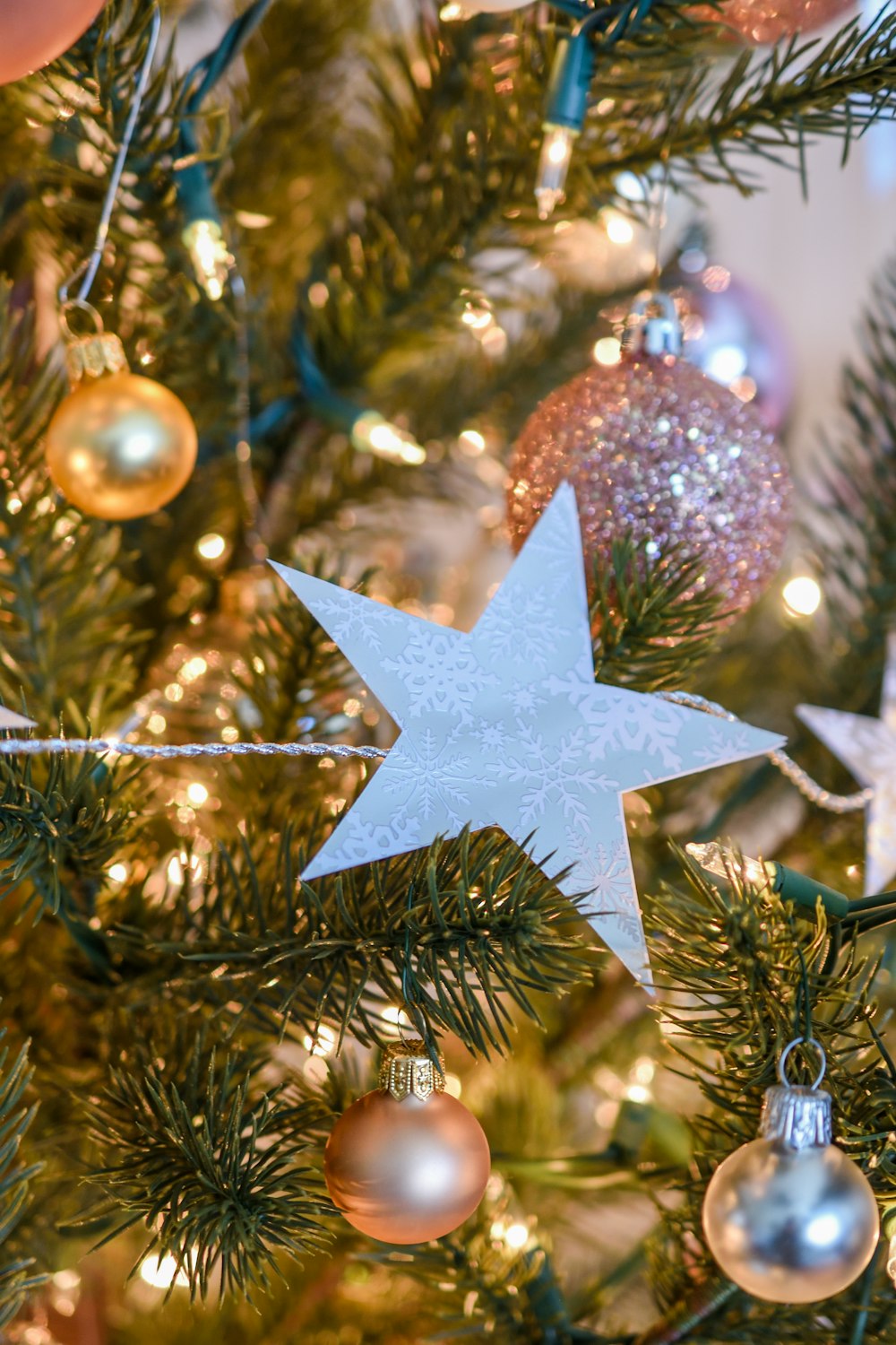 a christmas tree with ornaments and lights