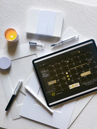 A set of digital planners and calendars with sleek layouts in white and yellow tones.