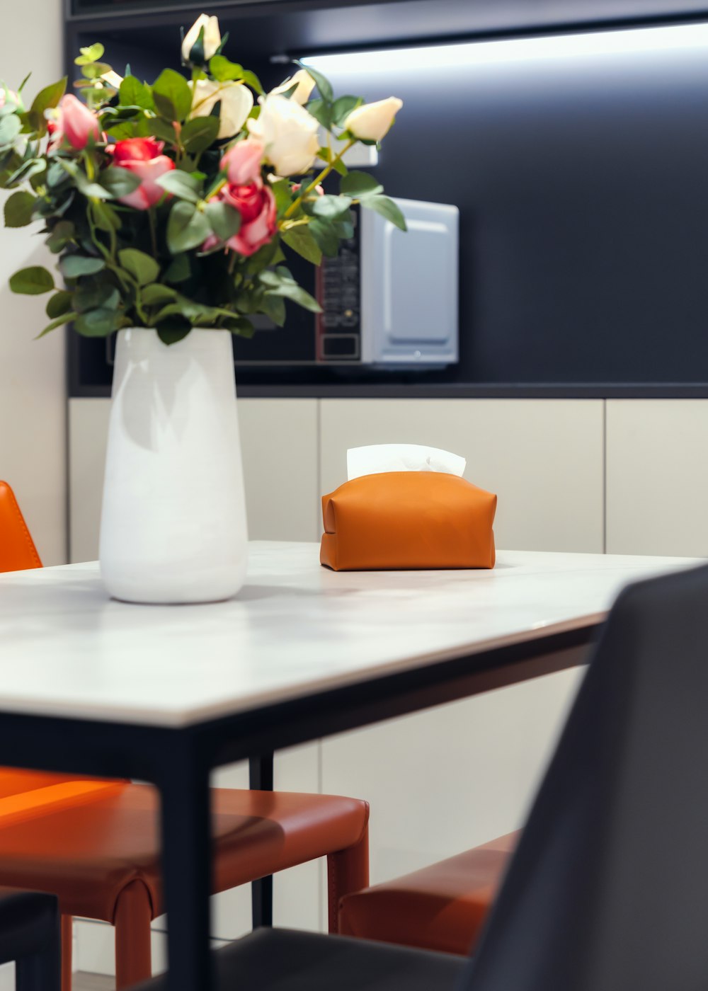 a vase of flowers on a table