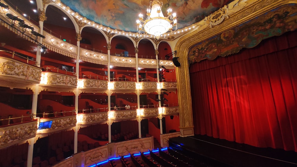 a room with a stage and a curtain