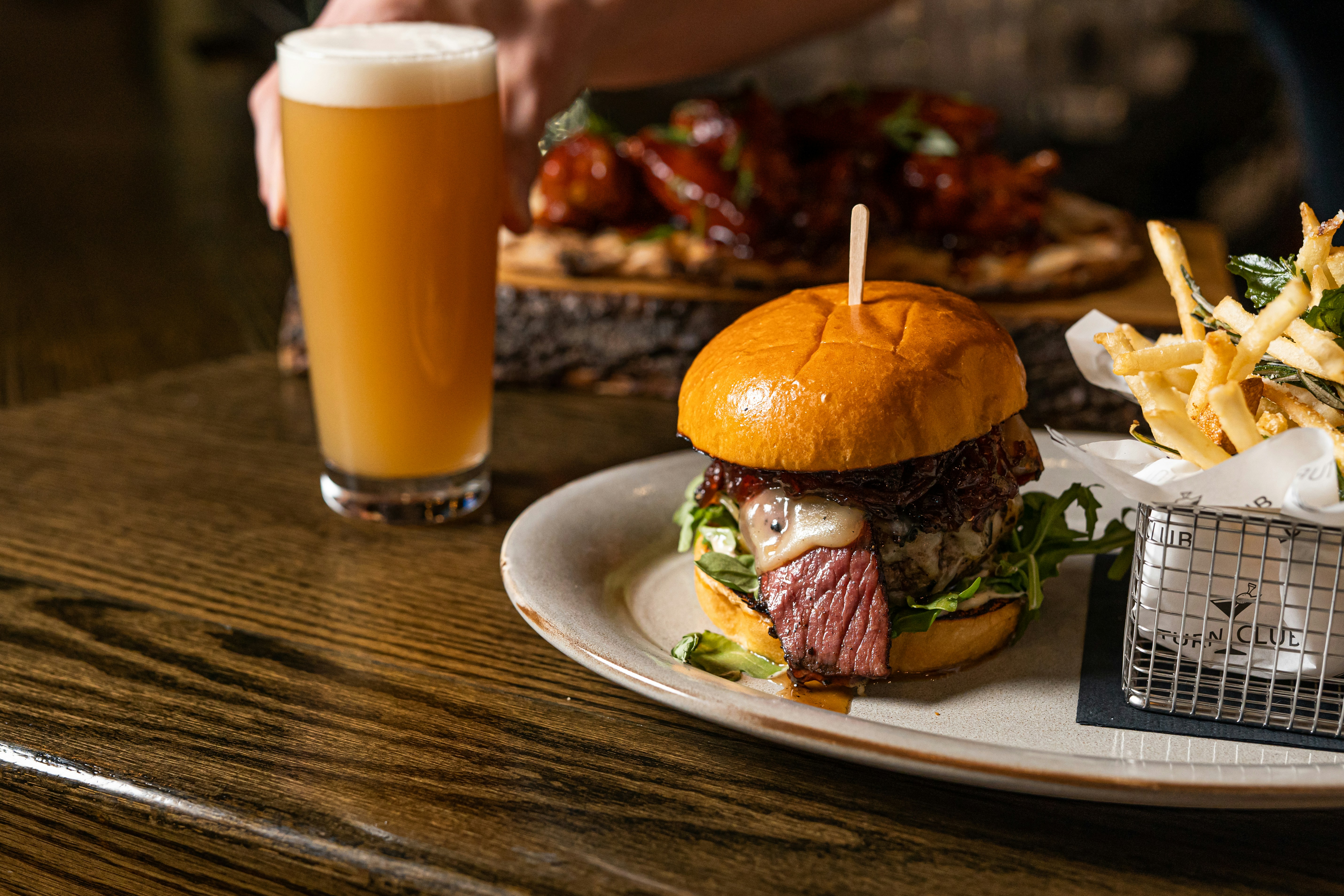 a burger and fries on a plate
