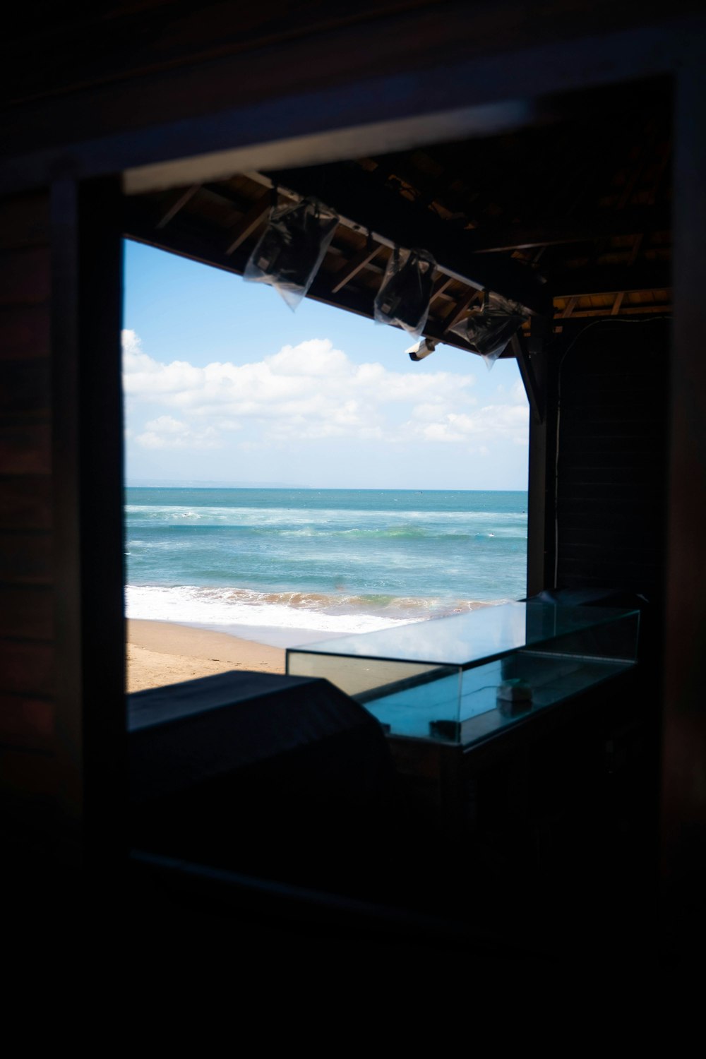 a view of the ocean through a window