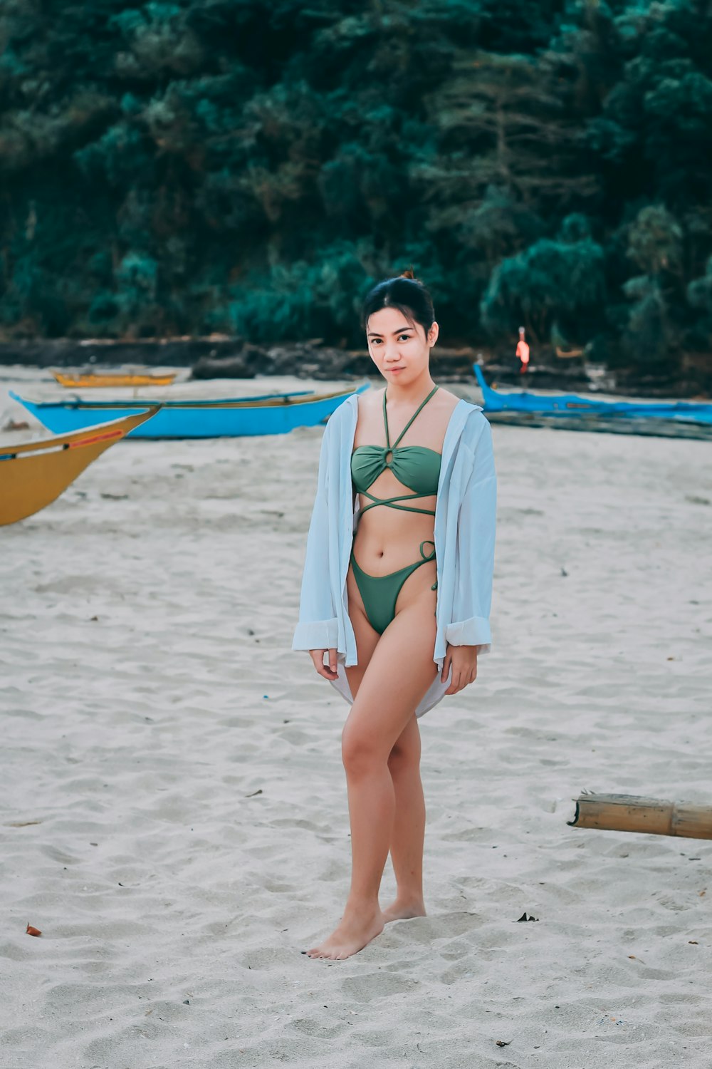 a person in a garment on a beach