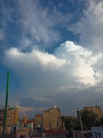A vibrant photo of a completed construction project under a clear blue sky