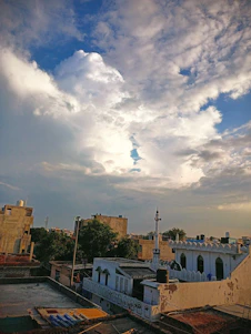 A scenic view of a Moroccan city skyline with modern buildings and traditional architecture.