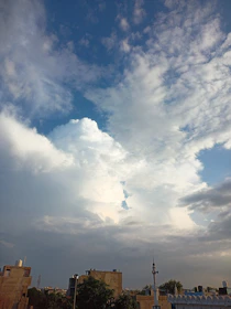 A digital cloud icon hovering over a cityscape of Riyadh, representing cloud services.