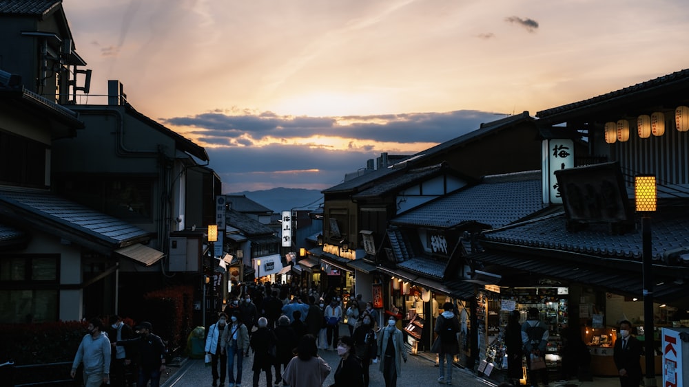 a group of people walking in a town