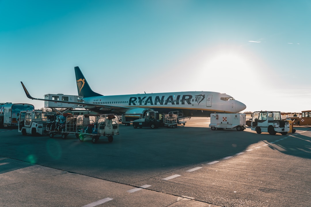 a large airplane is parked at an airport, A plane at the airport.
