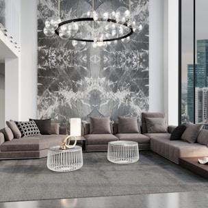 Luxurious modern living room with custom-designed furniture in a sleek architectural space.