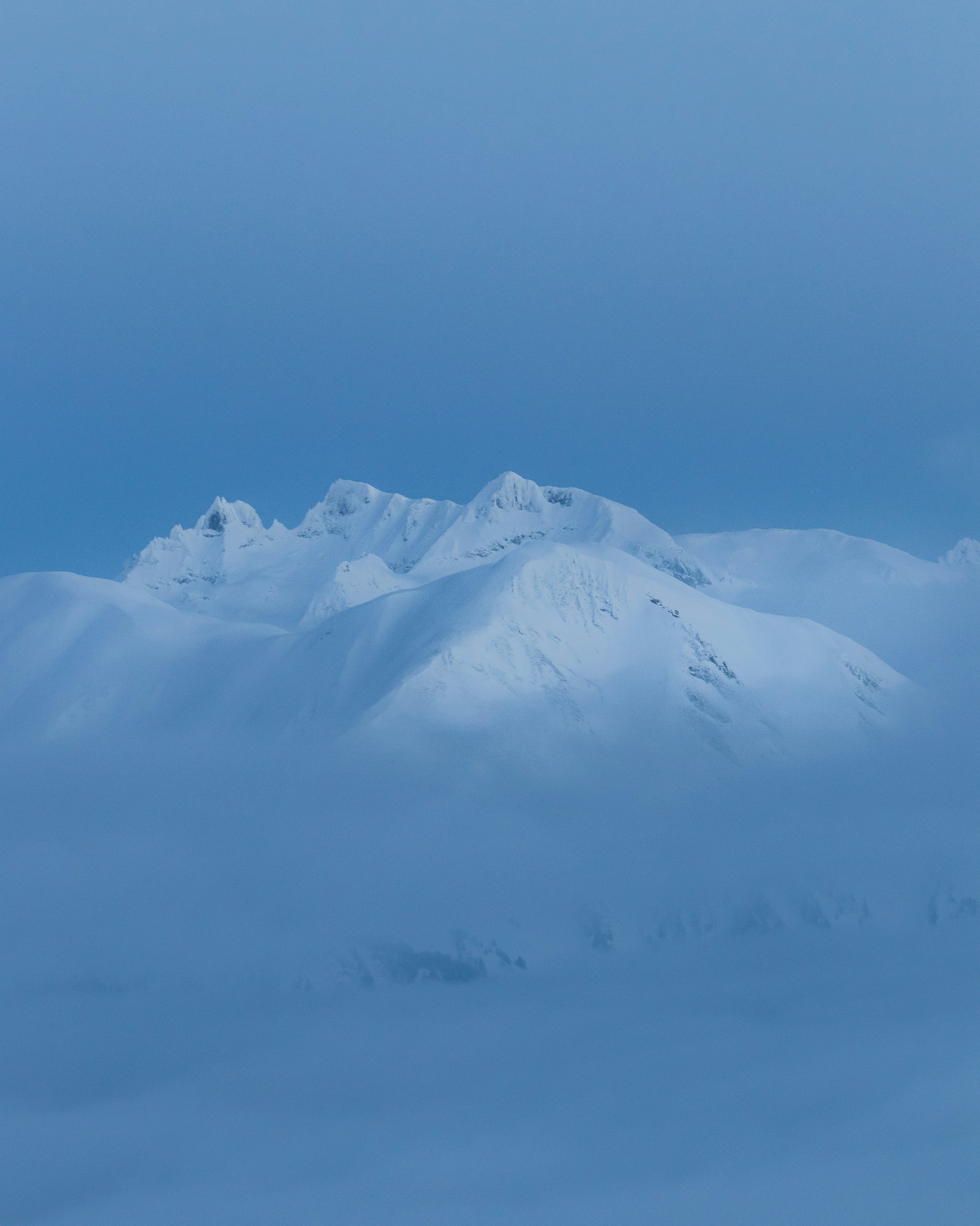 A mountain covered in snow photo Free Switzerland Image on Unsplash