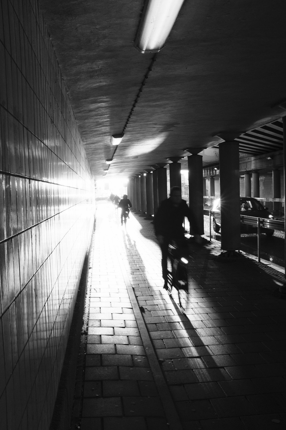 a person walking down a sidewalk