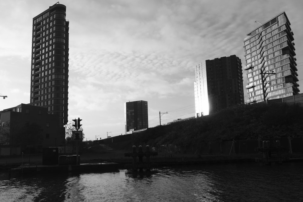 a city skyline with tall buildings