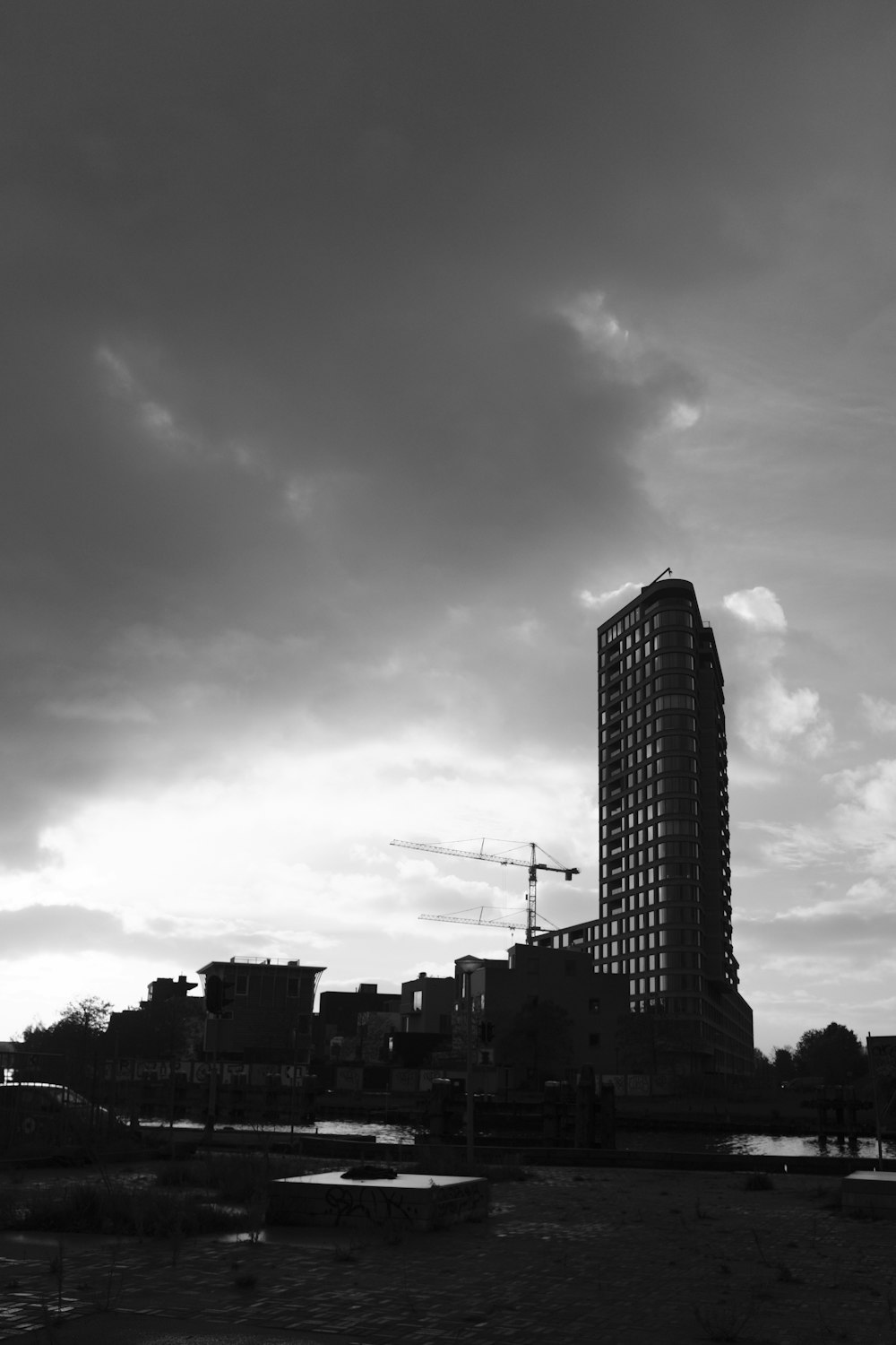 a tall building with a crane