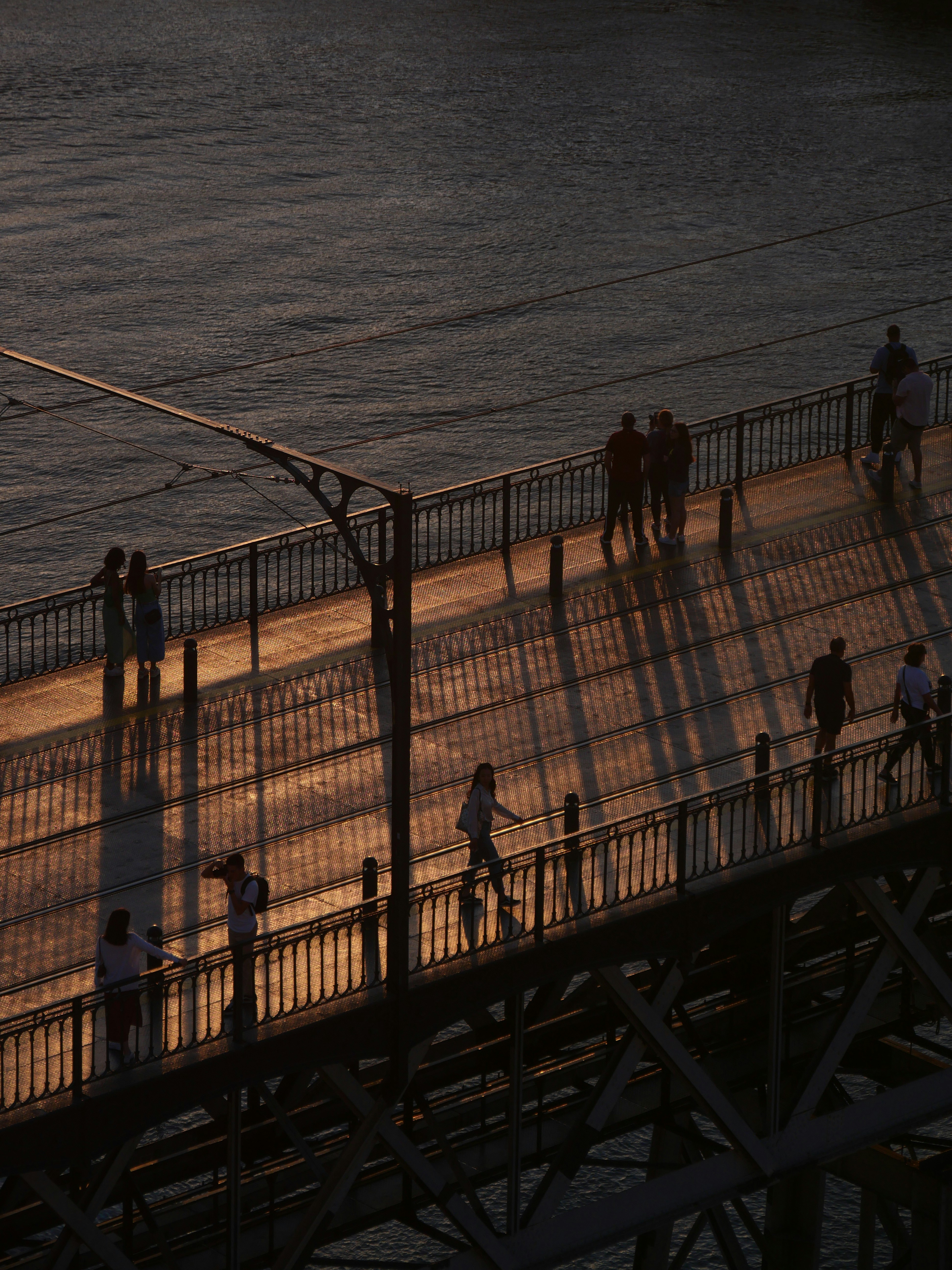a group of people on a bridge