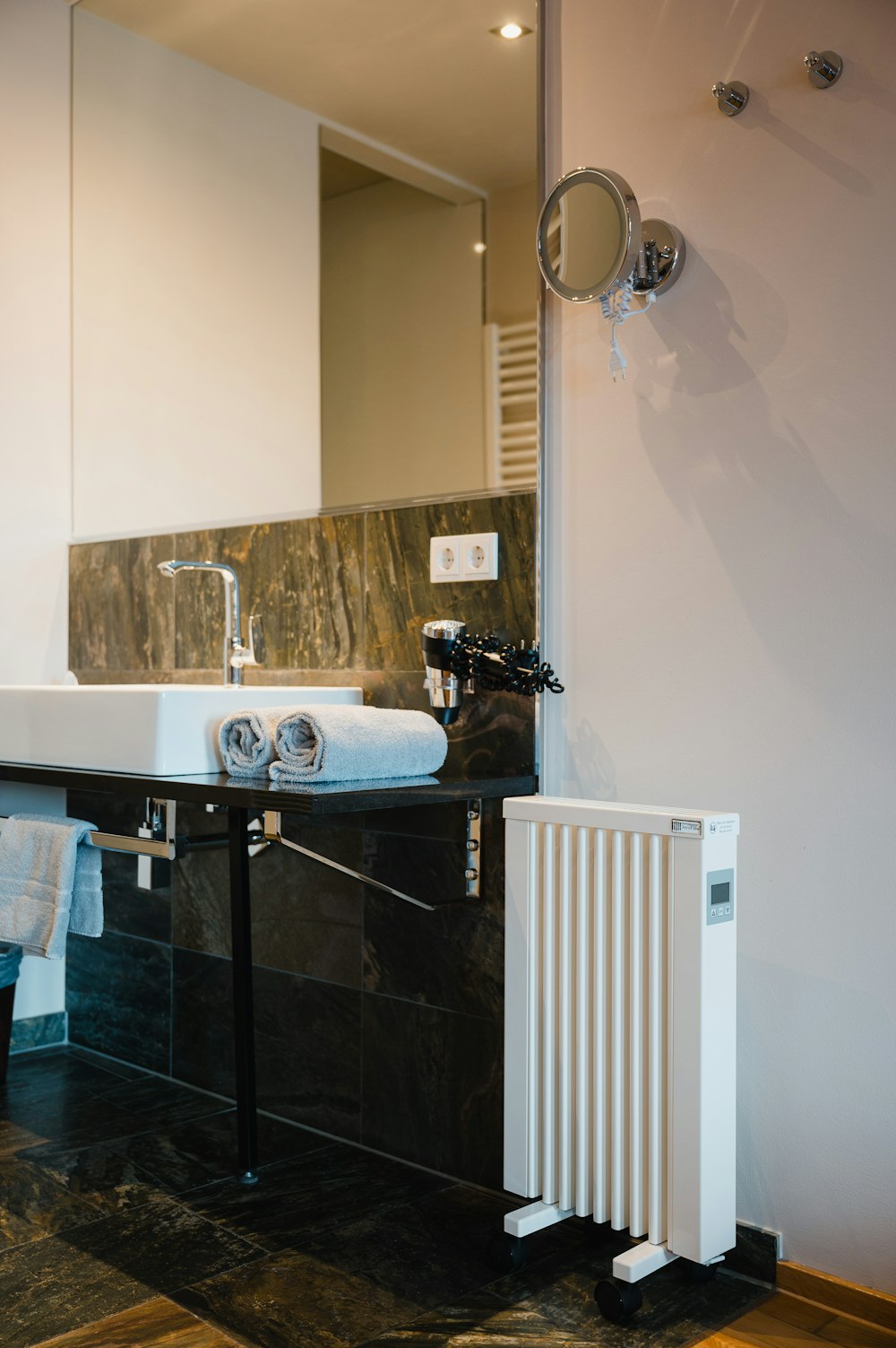 a bathroom with a large mirror