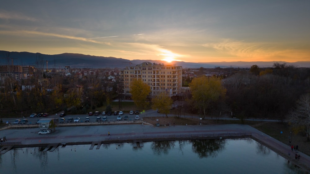 a body of water with a city in the background