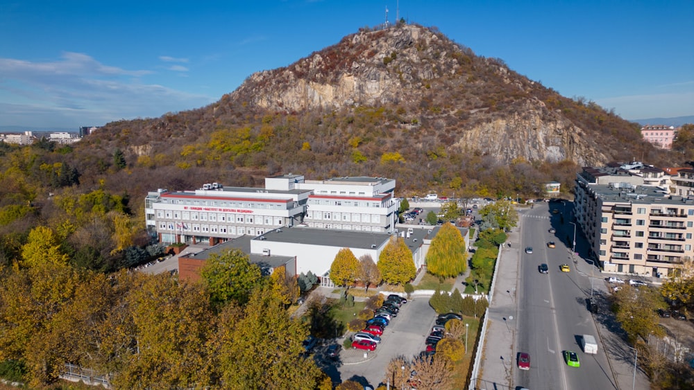 a large building with a parking lot in front of it