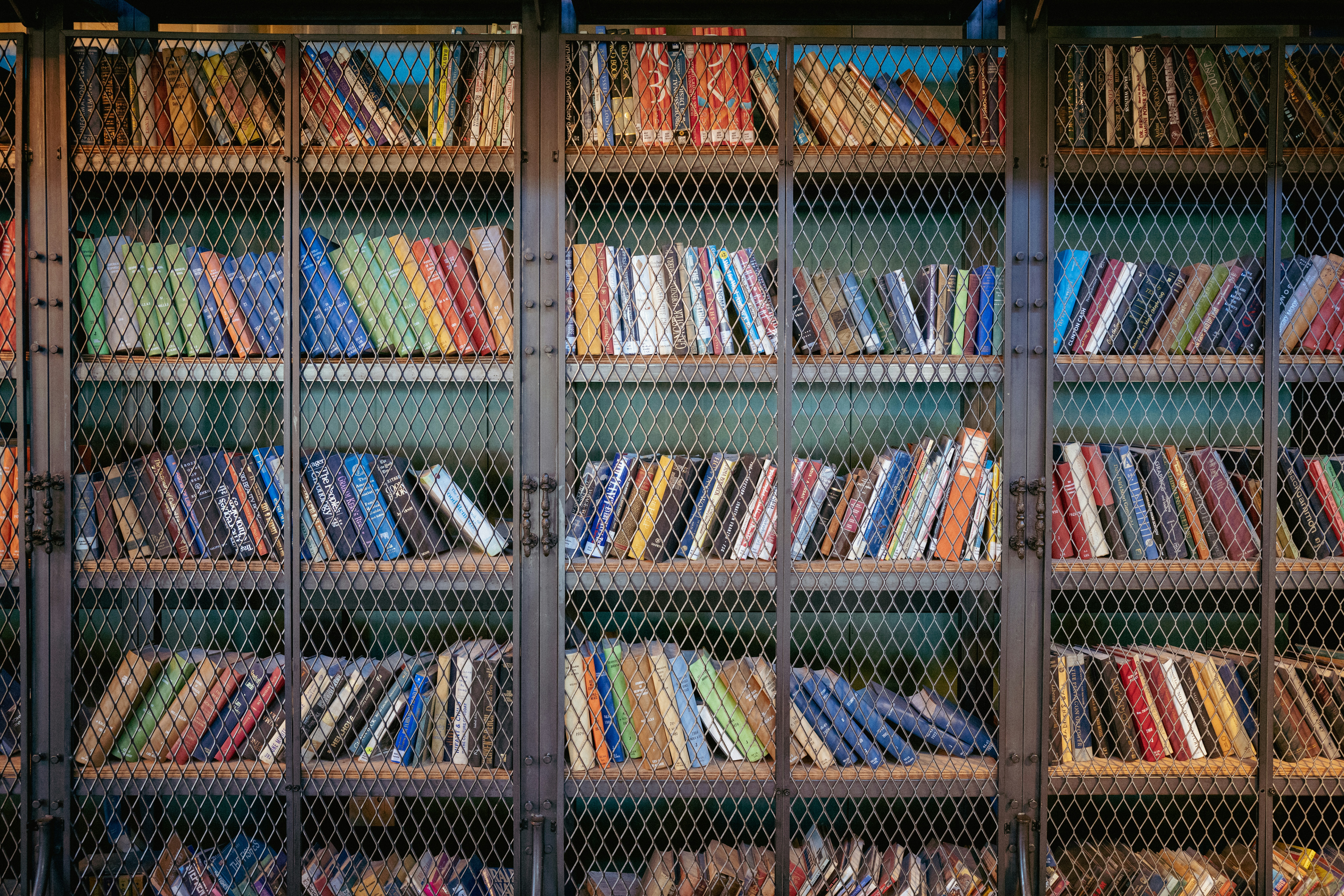 A shelf with many books on it photo – Free Book Image on Unsplash