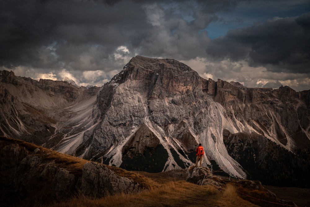 a person standing on a rock