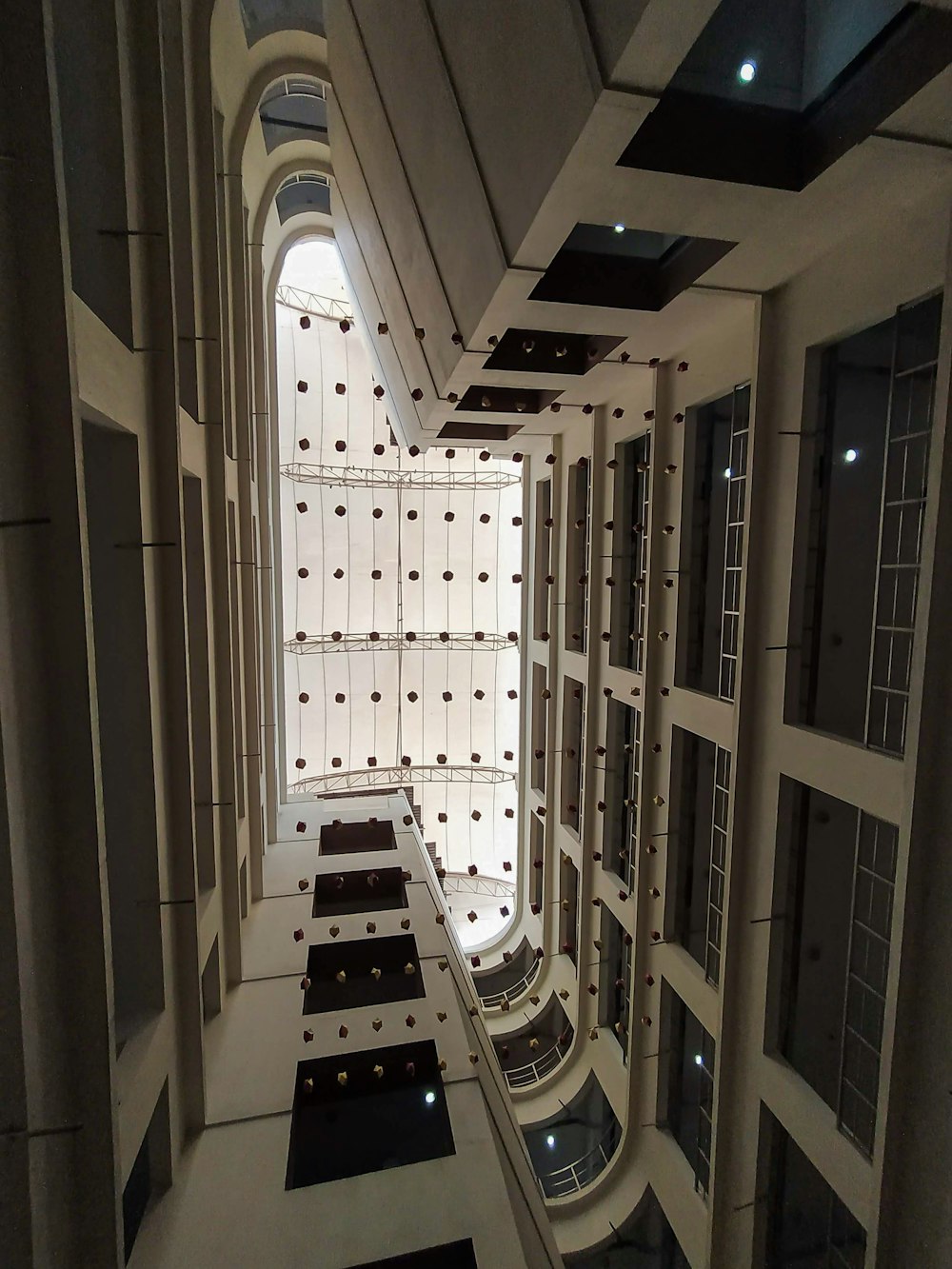 a hallway with glass walls