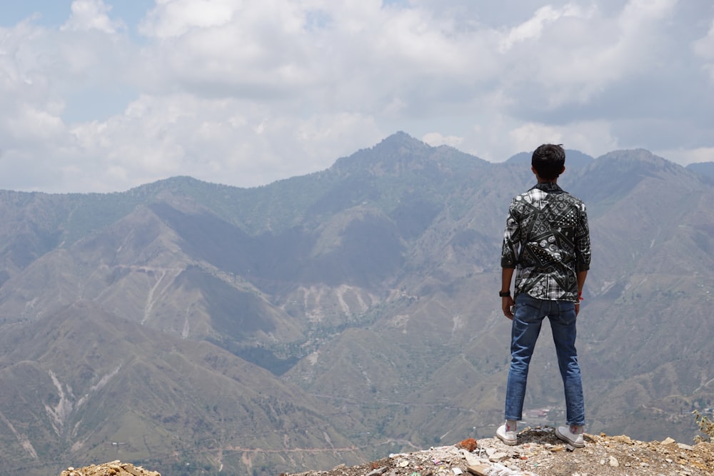 a man standing on a mountain