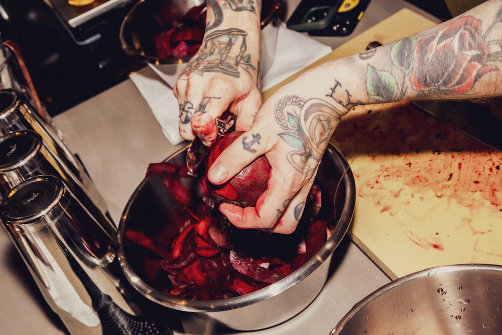 a person cooking food in a pan