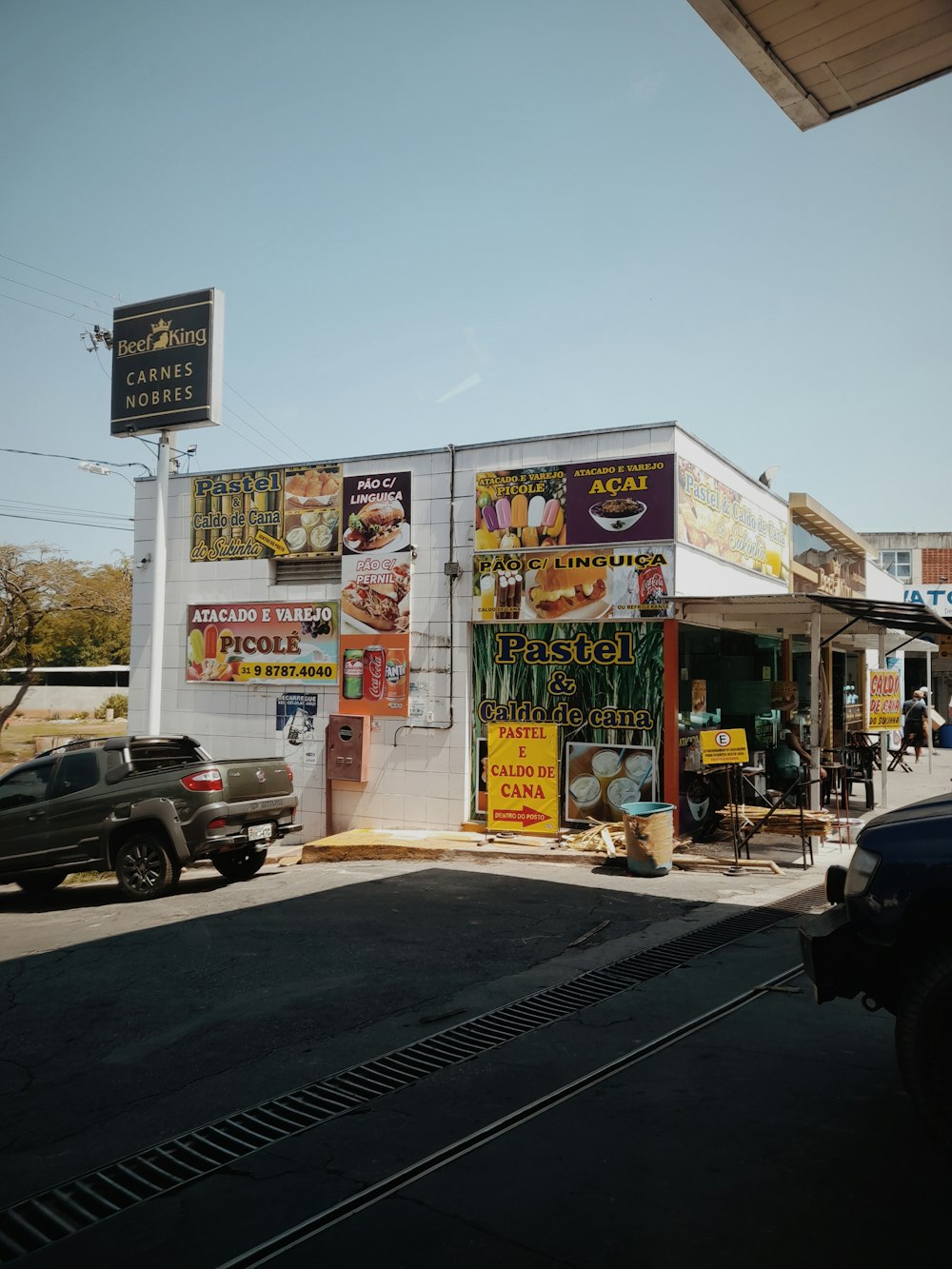 a store front with signs