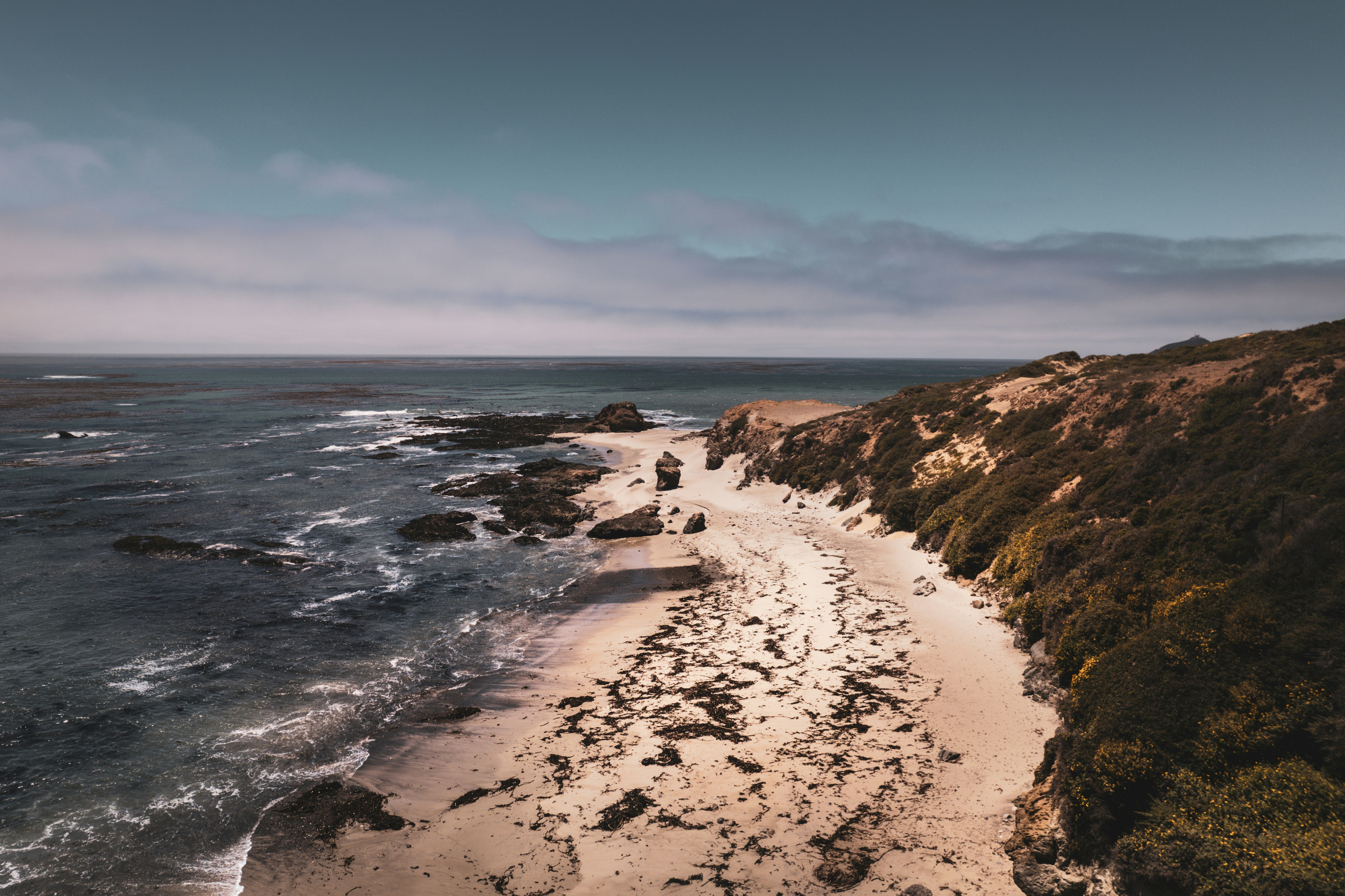 a beach with rocks and water