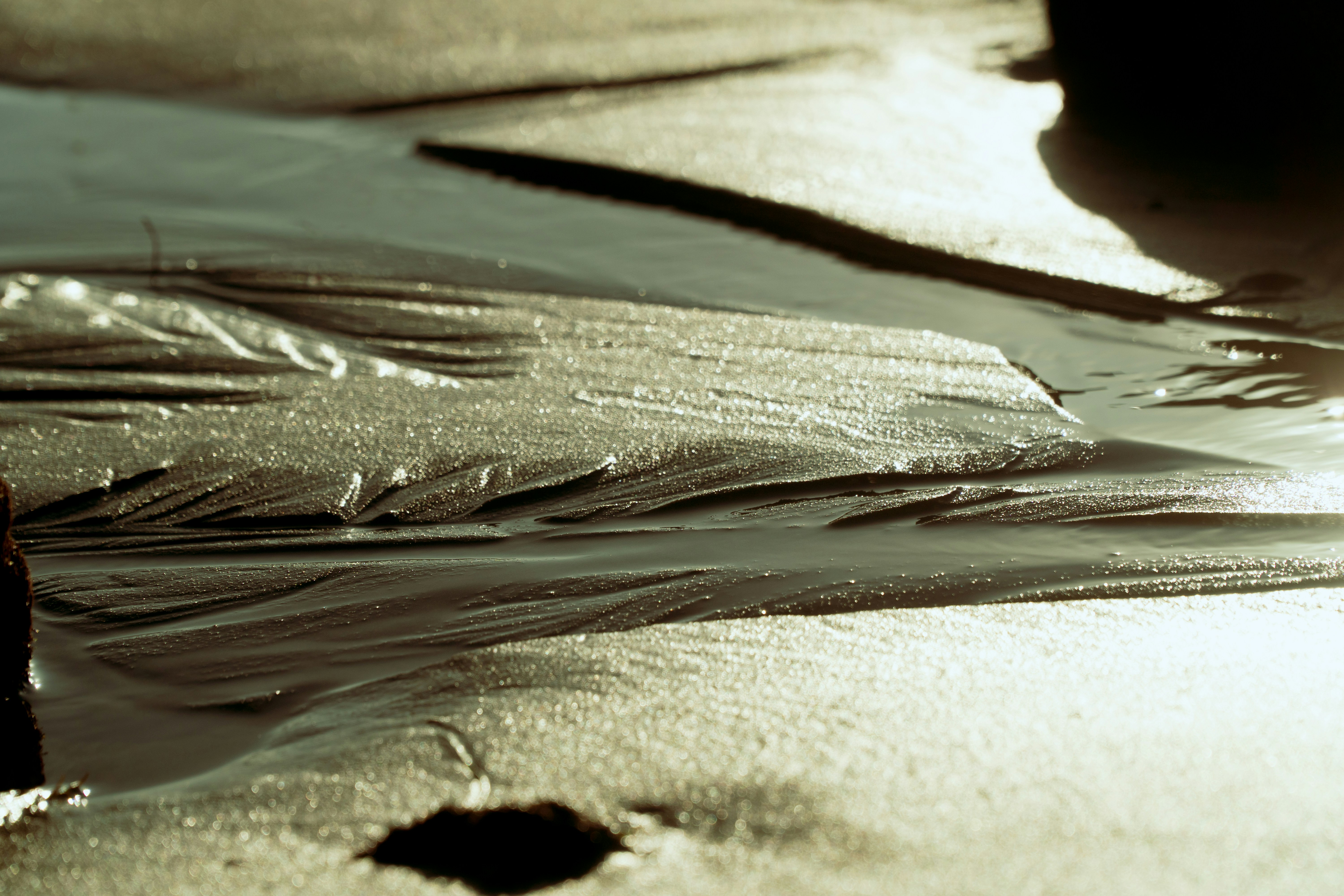 a close up of a wet road