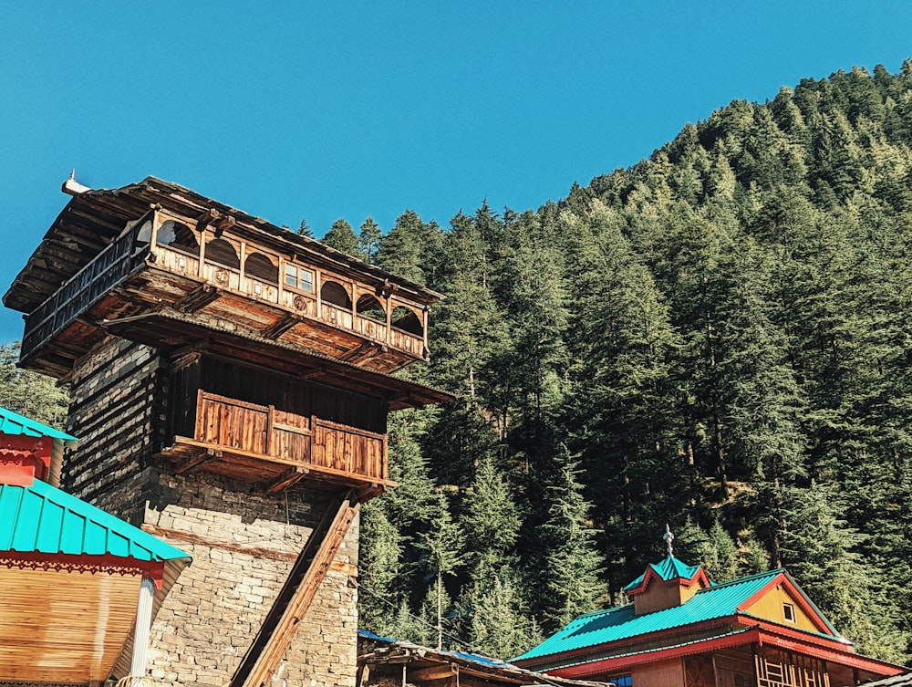 a building with a hill in the background