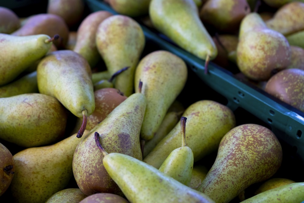 a group of yellow and green fruits