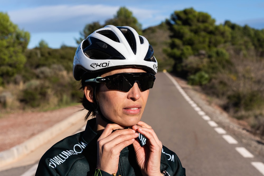 a person wearing a helmet and sunglasses