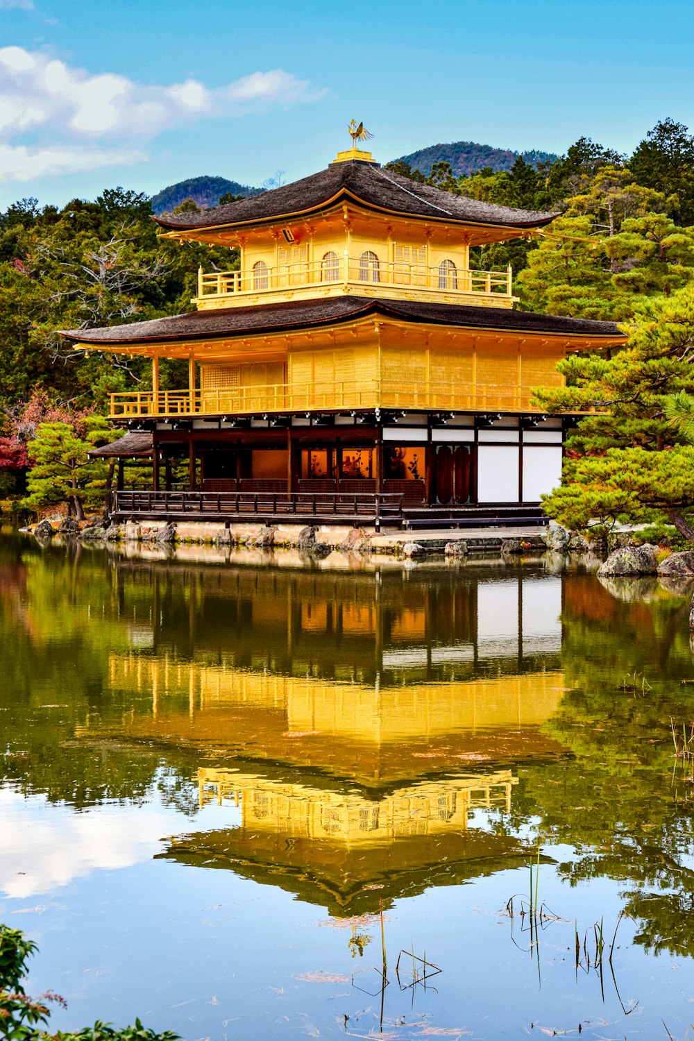 Kinkaku-ji with a pond in front of it