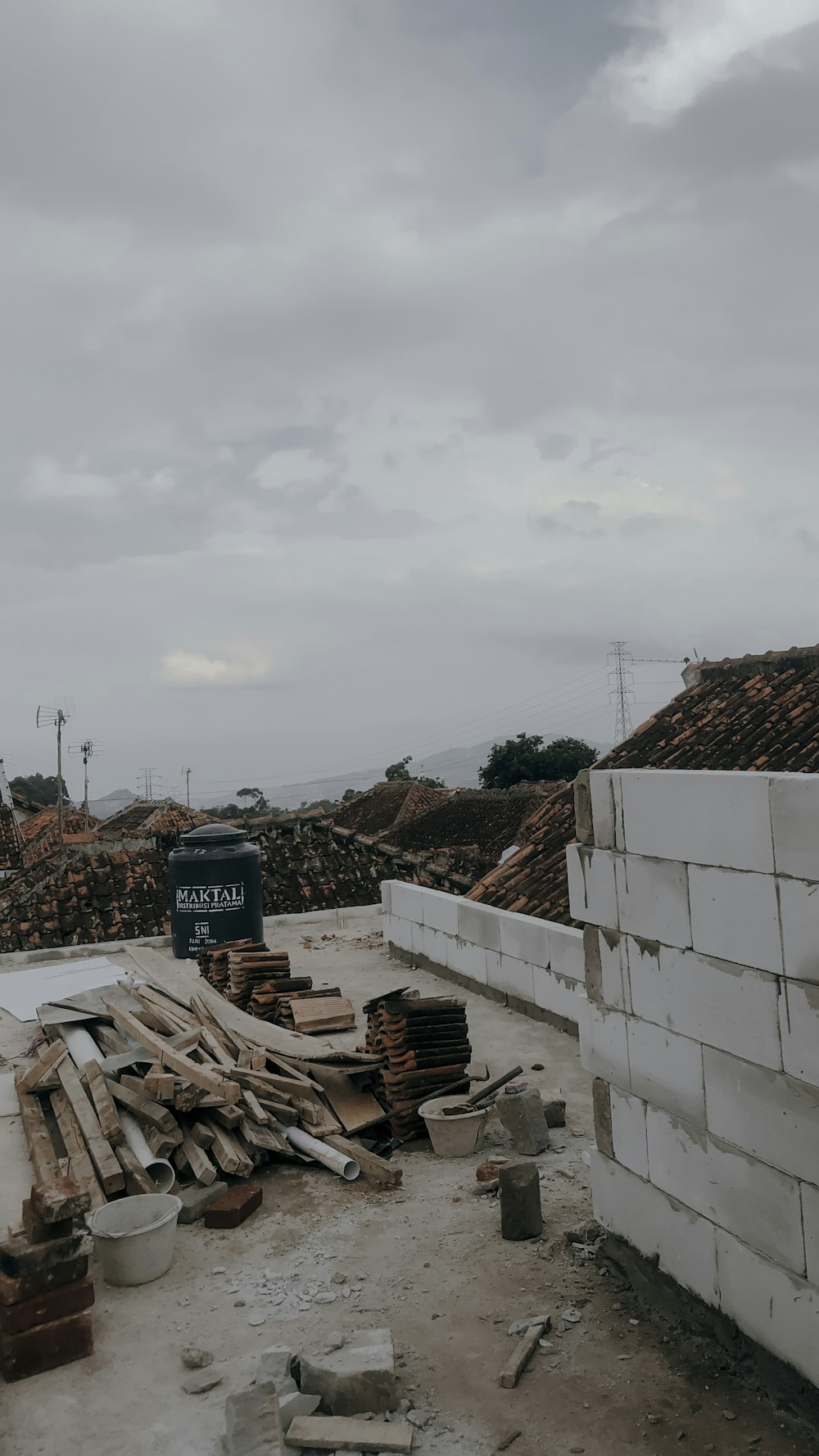 a pile of rubble next to a building