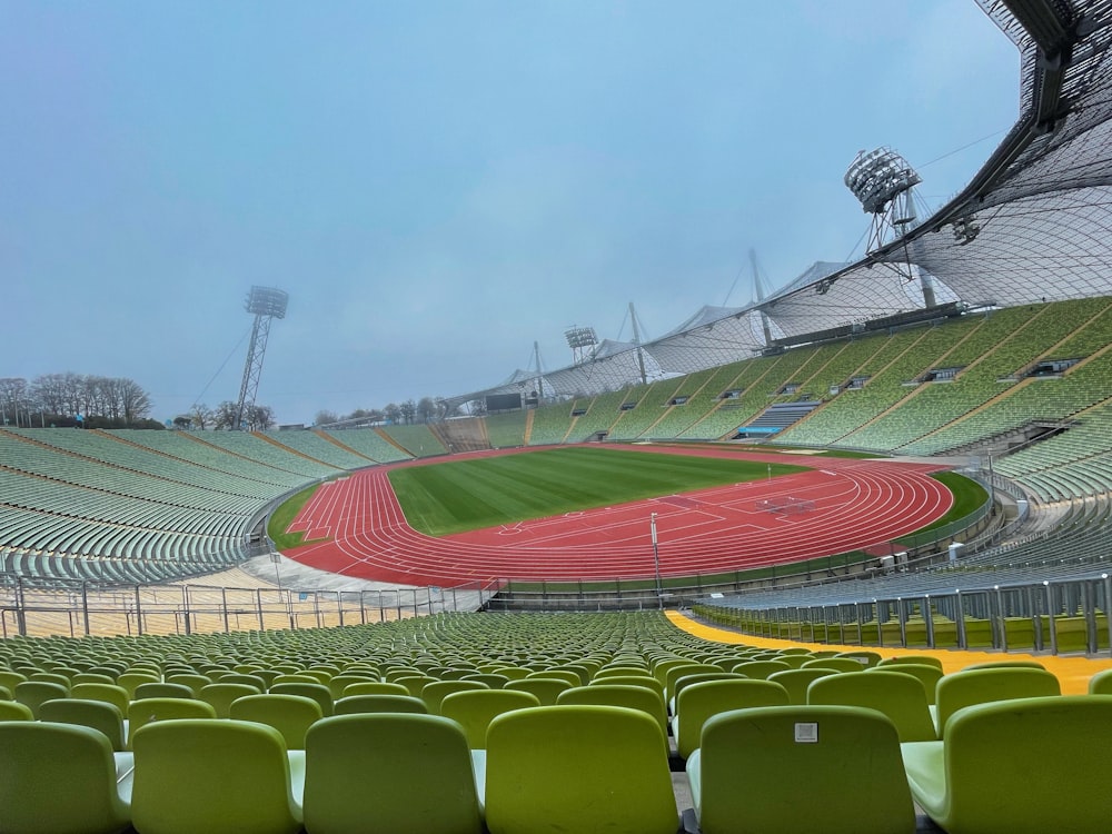 a sports stadium with green seats