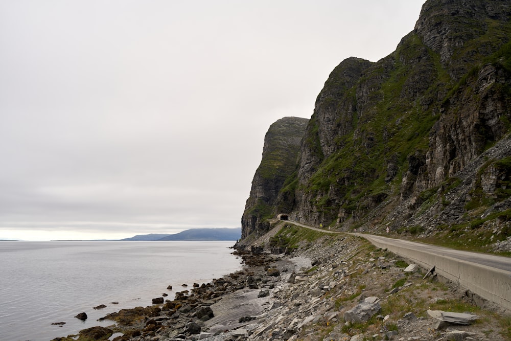 a road next to a cliff
