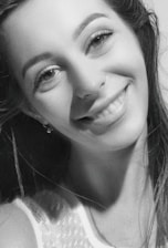 A warm portrait of a young woman celebrating her 15th birthday, smiling naturally.