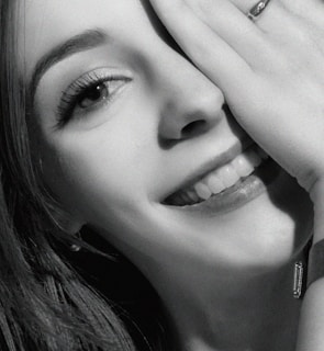 Before and after photo of a smiling woman showing her weight loss progress.