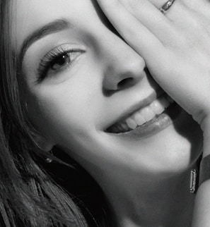 Before and after photo of a smiling woman showing her weight loss progress